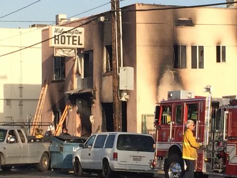 Exterior of Hotel with burn marks.