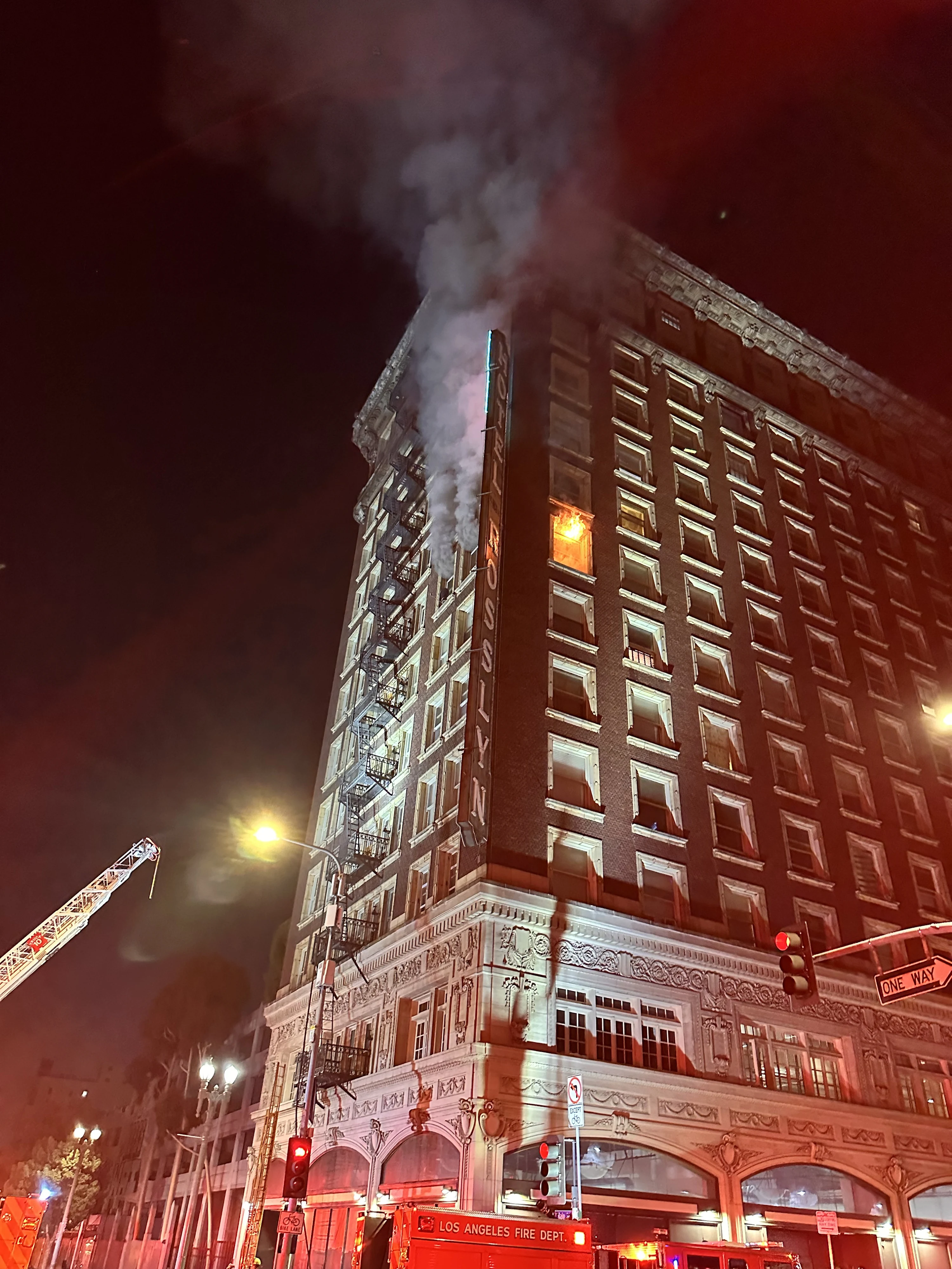Smoke showing from a window on the 7th floor of a 12 story apartment building